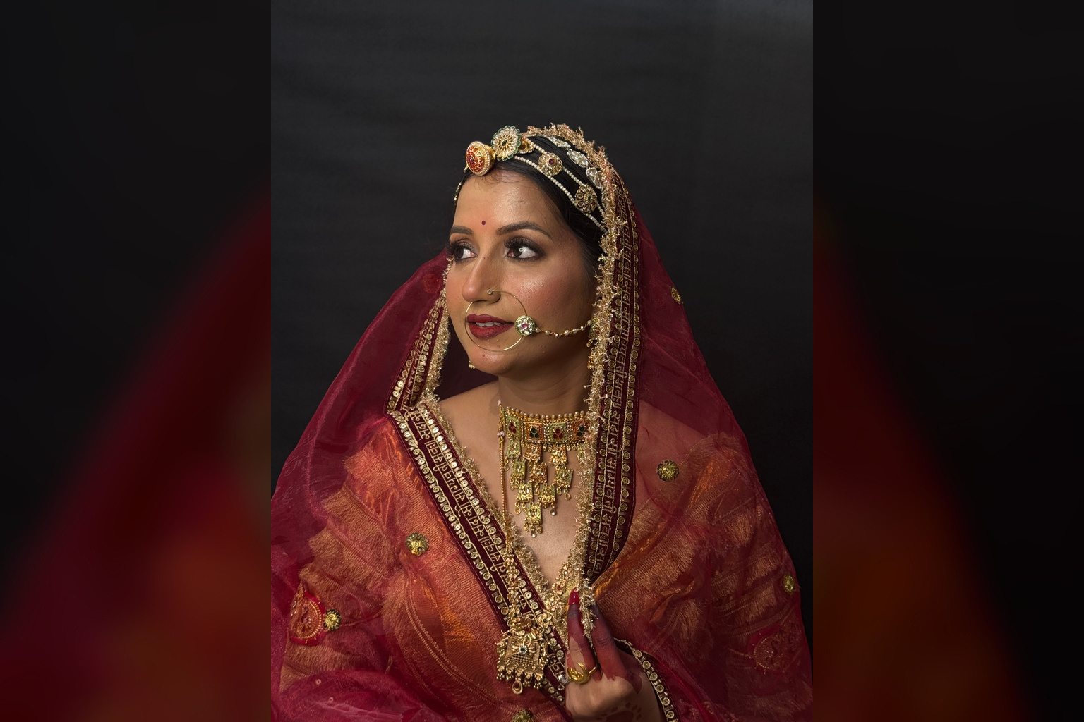 Classic red and gold bridal makeup look created by AS Glam Makeup Studio in Lucknow